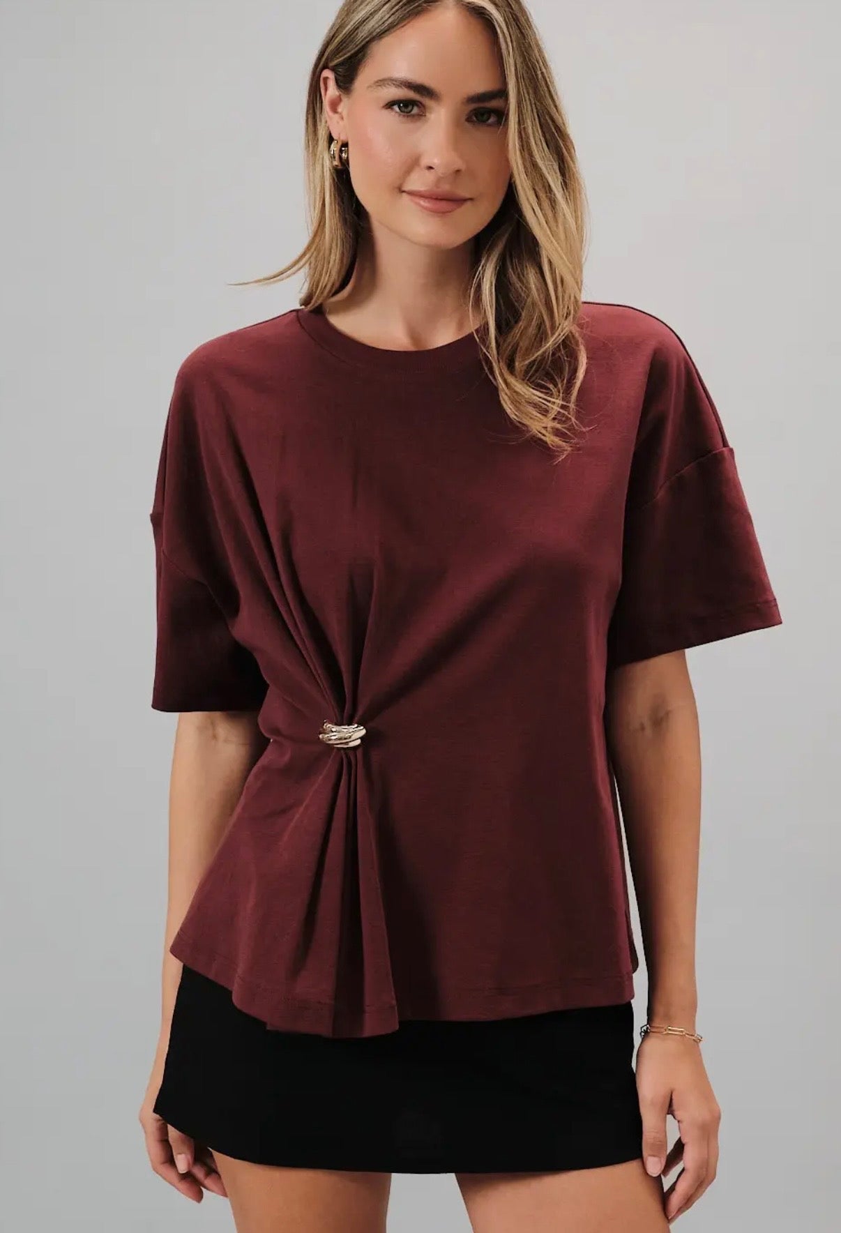Loose fit crew shirt with metal knot trim